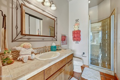 Here is an exceptional turnkey home located in Pinnacle Canyon a on Troon North Golf Club  in Arizona - for sale on GolfHomes.com, golf home, golf lot