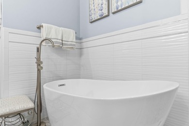 Elegant Charleston-style custom home located in an amenity-rich on Lockwood Folly Country Club in North Carolina - for sale on GolfHomes.com, golf home, golf lot