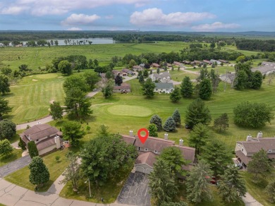 Experience living at its finest with this impeccable 2 bed, 2.5 on Saddle Ridge Golf Club in Wisconsin - for sale on GolfHomes.com, golf home, golf lot