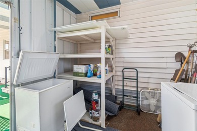 Cozy Beach-Cottage Vibes in Fairway Village -- Where the Living on Fairway Village Golf Course in Florida - for sale on GolfHomes.com, golf home, golf lot