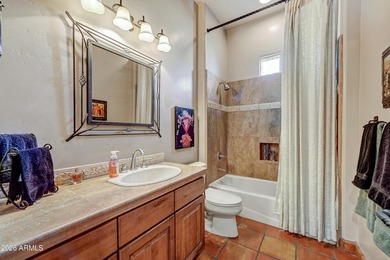 Here is an exceptional turnkey home located in Pinnacle Canyon a on Troon North Golf Club  in Arizona - for sale on GolfHomes.com, golf home, golf lot