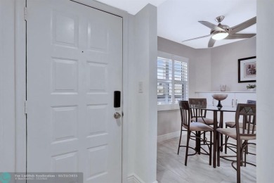 Move right into this tropical paradise of Wynmoor Village! Fully on Wynmoor Golf Course in Florida - for sale on GolfHomes.com, golf home, golf lot