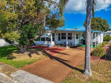 Cozy Beach-Cottage Vibes in Fairway Village -- Where the Living on Fairway Village Golf Course in Florida - for sale on GolfHomes.com, golf home, golf lot
