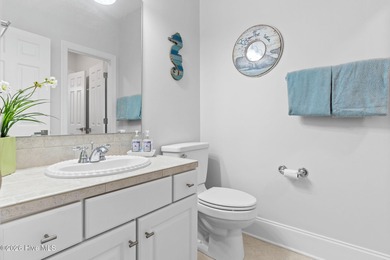 Elegant Charleston-style custom home located in an amenity-rich on Lockwood Folly Country Club in North Carolina - for sale on GolfHomes.com, golf home, golf lot