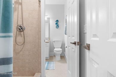 Elegant Charleston-style custom home located in an amenity-rich on Lockwood Folly Country Club in North Carolina - for sale on GolfHomes.com, golf home, golf lot