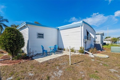 Cozy Beach-Cottage Vibes in Fairway Village -- Where the Living on Fairway Village Golf Course in Florida - for sale on GolfHomes.com, golf home, golf lot