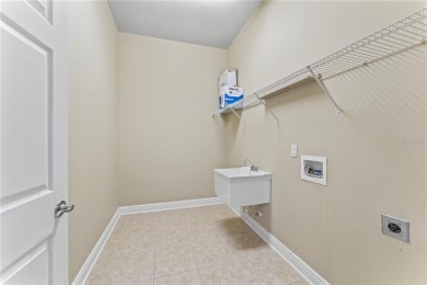 Welcome to this lovingly maintained home, located in the gated on Heritage Isles Golf and Country Club in Florida - for sale on GolfHomes.com, golf home, golf lot