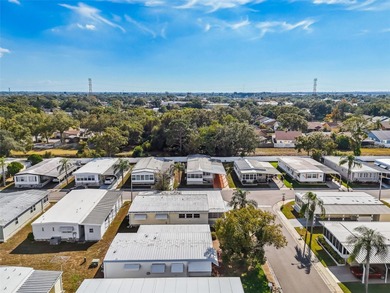 Cozy Beach-Cottage Vibes in Fairway Village -- Where the Living on Fairway Village Golf Course in Florida - for sale on GolfHomes.com, golf home, golf lot