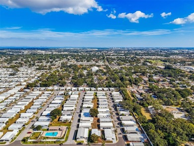 Cozy Beach-Cottage Vibes in Fairway Village -- Where the Living on Fairway Village Golf Course in Florida - for sale on GolfHomes.com, golf home, golf lot