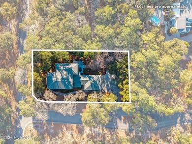 Elegant Charleston-style custom home located in an amenity-rich on Lockwood Folly Country Club in North Carolina - for sale on GolfHomes.com, golf home, golf lot