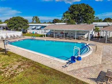 Cozy Beach-Cottage Vibes in Fairway Village -- Where the Living on Fairway Village Golf Course in Florida - for sale on GolfHomes.com, golf home, golf lot