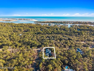 Elegant Charleston-style custom home located in an amenity-rich on Lockwood Folly Country Club in North Carolina - for sale on GolfHomes.com, golf home, golf lot