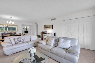 Welcome to this beautifully remodeled 2-bedroom, 2-bathroom on Palm-Aire Country Club and Resort - Palms in Florida - for sale on GolfHomes.com, golf home, golf lot
