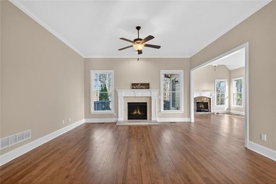 Located in BridgeMill, this well-maintained home offers the on Bridgemill Golf Club in Georgia - for sale on GolfHomes.com, golf home, golf lot