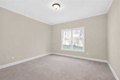 Located in BridgeMill, this well-maintained home offers the on Bridgemill Golf Club in Georgia - for sale on GolfHomes.com, golf home, golf lot