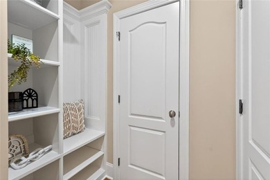 Located in BridgeMill, this well-maintained home offers the on Bridgemill Golf Club in Georgia - for sale on GolfHomes.com, golf home, golf lot