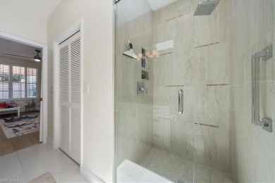 Enjoy expansive golf course views as you float in your pool or on Wyndemere Country Club in Florida - for sale on GolfHomes.com, golf home, golf lot
