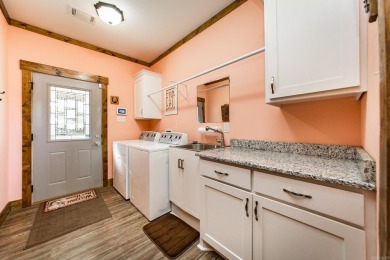 Discover your dream retreat on the picturesque shores of Greers on  in Arkansas - for sale on GolfHomes.com, golf home, golf lot