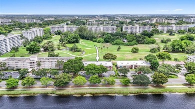 Welcome to this beautifully remodeled 2-bedroom, 2-bathroom on Palm-Aire Country Club and Resort - Palms in Florida - for sale on GolfHomes.com, golf home, golf lot