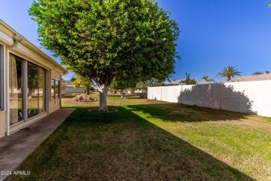 This stunning home is a perfect blend of elegance and on Sun City Country Club in Arizona - for sale on GolfHomes.com, golf home, golf lot