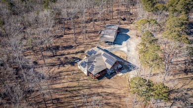 Discover your dream retreat on the picturesque shores of Greers on  in Arkansas - for sale on GolfHomes.com, golf home, golf lot