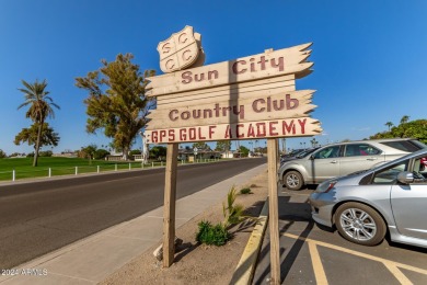 This stunning home is a perfect blend of elegance and on Sun City Country Club in Arizona - for sale on GolfHomes.com, golf home, golf lot