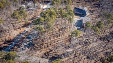 Discover your dream retreat on the picturesque shores of Greers on  in Arkansas - for sale on GolfHomes.com, golf home, golf lot