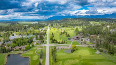 Overlooking the 1st fairway of Bigfork Montana's Eagle Bend Golf on Eagle Bend Golf Course in Montana - for sale on GolfHomes.com, golf home, golf lot