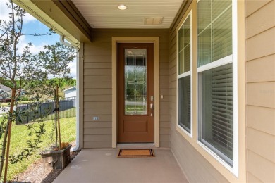 Set on a neat corner lot within the gated community of Ocala on Trilogy at Ocala Preserve in Florida - for sale on GolfHomes.com, golf home, golf lot