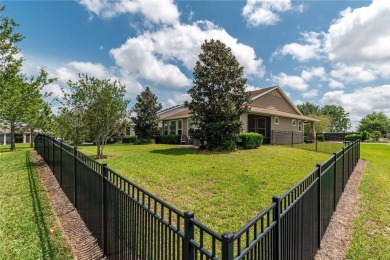Set on a neat corner lot within the gated community of Ocala on Trilogy at Ocala Preserve in Florida - for sale on GolfHomes.com, golf home, golf lot