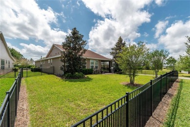 Set on a neat corner lot within the gated community of Ocala on Trilogy at Ocala Preserve in Florida - for sale on GolfHomes.com, golf home, golf lot