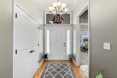 Well-maintained reverse 1.5-story single-family home in the on Golf Club of Creekmoor in Missouri - for sale on GolfHomes.com, golf home, golf lot