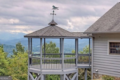 Breathtaking views abound from this 3-bedroom, 3.5-bath home on on Chatuge Shores Golf Course in North Carolina - for sale on GolfHomes.com, golf home, golf lot