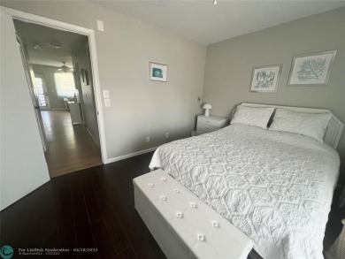 CUTE AS A BUTTON! CHARMING SECOND FLOOR 1 BEDROOM, 1 BATH CONDO on Hillsboro Pines Golf in Florida - for sale on GolfHomes.com, golf home, golf lot