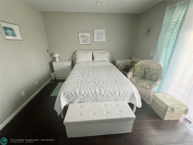 CUTE AS A BUTTON! CHARMING SECOND FLOOR 1 BEDROOM, 1 BATH CONDO on Hillsboro Pines Golf in Florida - for sale on GolfHomes.com, golf home, golf lot