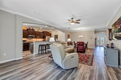 Welcome to a life that feels like vacation every day. Nestled in on Arlington Ridge Golf Club in Florida - for sale on GolfHomes.com, golf home, golf lot