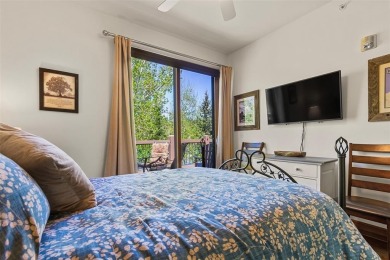 Tucked within a serene enclave of mature Aspens and beautifully on Breckenridge Golf Club in Colorado - for sale on GolfHomes.com, golf home, golf lot