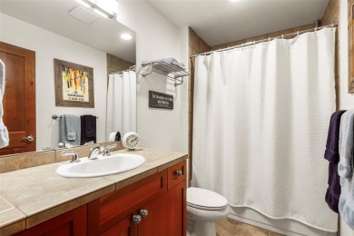 Tucked within a serene enclave of mature Aspens and beautifully on Breckenridge Golf Club in Colorado - for sale on GolfHomes.com, golf home, golf lot