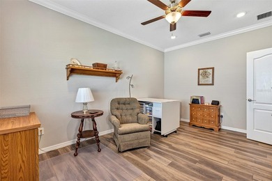 Welcome to a life that feels like vacation every day. Nestled in on Arlington Ridge Golf Club in Florida - for sale on GolfHomes.com, golf home, golf lot