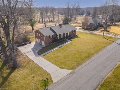 Charming Brick Ranch with Golf Course Views - Move-In Ready! on Pine Knolls Golf Course in North Carolina - for sale on GolfHomes.com, golf home, golf lot