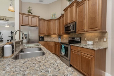 Experience the perfect blend of elegance and convenience in the on Bobcat Trail Golf Club in Florida - for sale on GolfHomes.com, golf home, golf lot