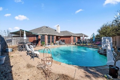 Welcome to this beautiful brick home nestled on an oversized on Mansfield National Golf Club in Texas - for sale on GolfHomes.com, golf home, golf lot