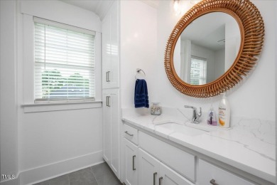 This stunning custom-built residence combines modern design on Henderson Country Club in North Carolina - for sale on GolfHomes.com, golf home, golf lot