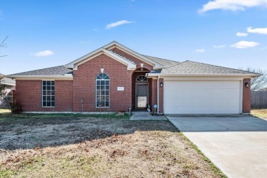 Welcome to this beautiful brick home nestled on an oversized on Mansfield National Golf Club in Texas - for sale on GolfHomes.com, golf home, golf lot