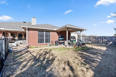 Welcome to this beautiful brick home nestled on an oversized on Mansfield National Golf Club in Texas - for sale on GolfHomes.com, golf home, golf lot