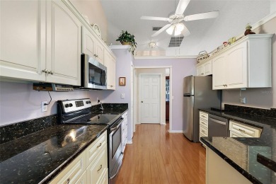 FANTASTIC, 3/2 home with EXPANSIVE ENCLOSED LANAI and REAR PATIO on Plantation Golf Club in Florida - for sale on GolfHomes.com, golf home, golf lot