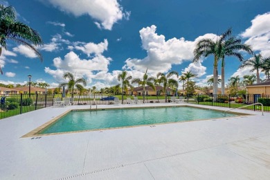 Experience the perfect blend of elegance and convenience in the on Bobcat Trail Golf Club in Florida - for sale on GolfHomes.com, golf home, golf lot