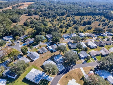 LOCATION LOCATION ...Welcome to the Village of Orange Blossom on El Diablo Executive Golf Course in Florida - for sale on GolfHomes.com, golf home, golf lot