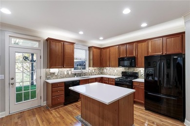 Set on a welcoming, family-friendly street, this home is on Charlie Yates Golf Course in Georgia - for sale on GolfHomes.com, golf home, golf lot