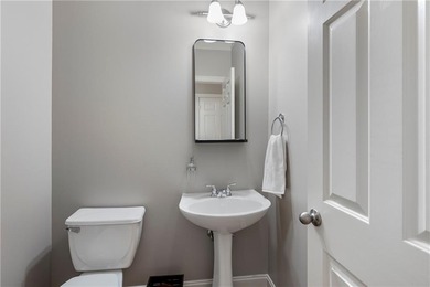 Set on a welcoming, family-friendly street, this home is on Charlie Yates Golf Course in Georgia - for sale on GolfHomes.com, golf home, golf lot